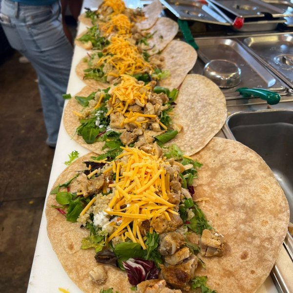 Wraps getting made in the open kitchen at Homespun Kitchen Atlantic Beach